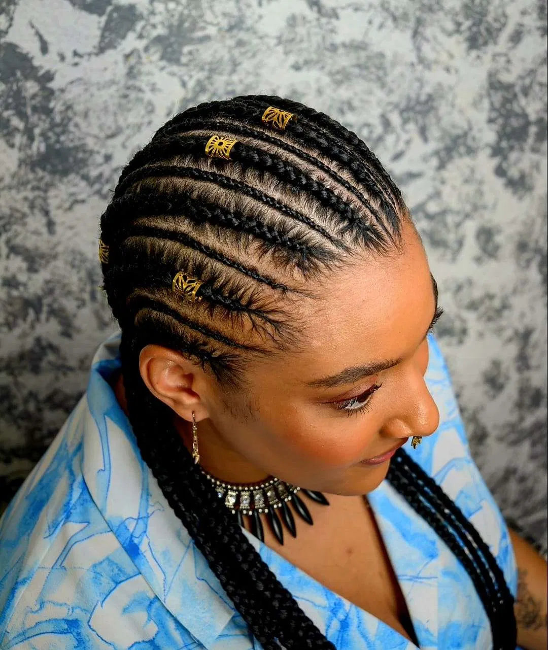 Detailed cornrows styled by Zaina